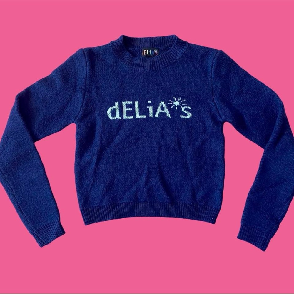 cozy delia’s logo graphic navy sweater